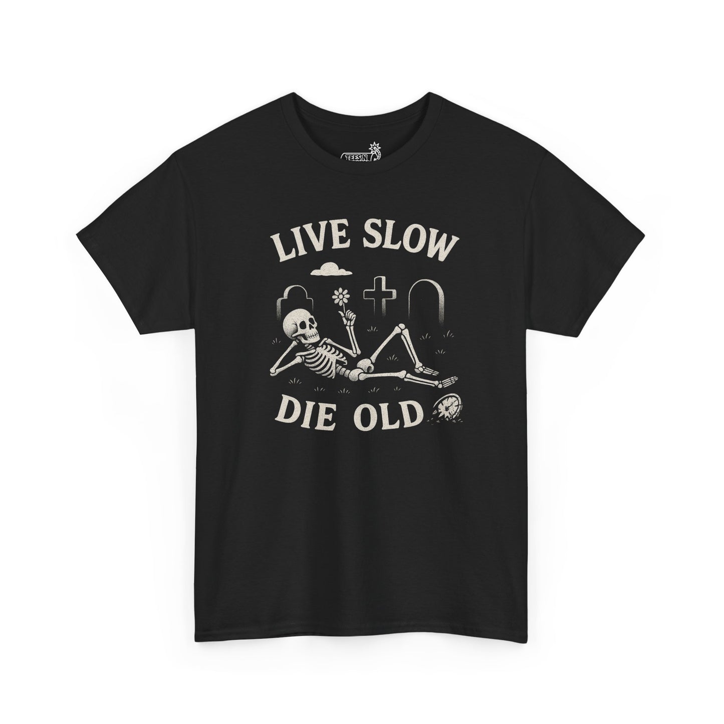 Black t-shirt with relaxing skeleton holding flower graphic and 'Live Slow Die Old' text