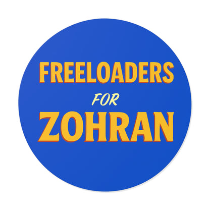 Circular sticker with 'Freeloaders for Zohran' text on a blue background